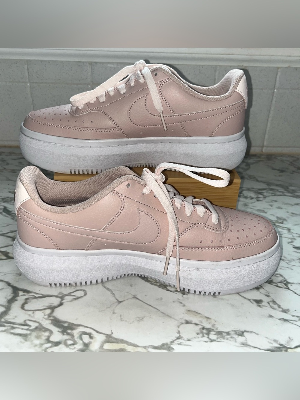 Nike Court Vision Alta Women's Platform Sneakers in the "Pink Oxford" colorway.